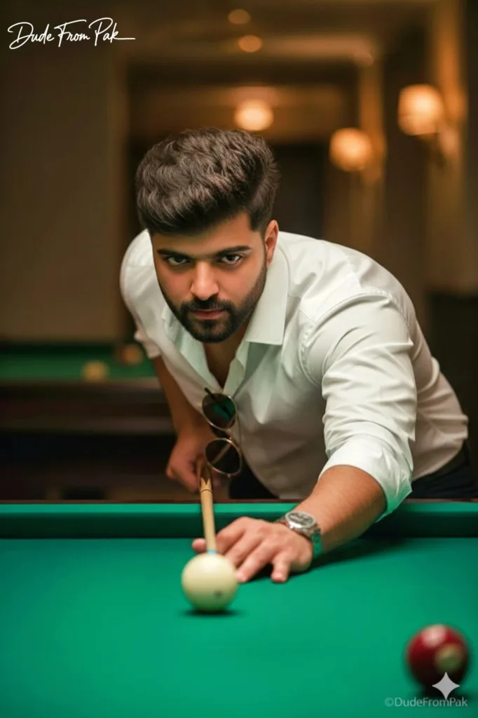 Pakistani man leaning over billiard table in cinematic focus